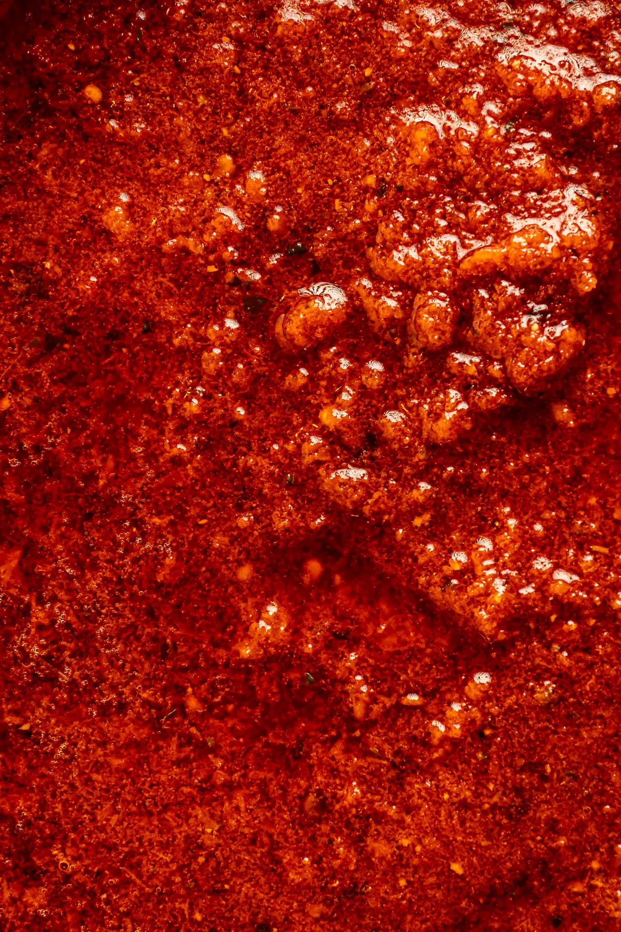 Foto aproximada de molho de tomate.